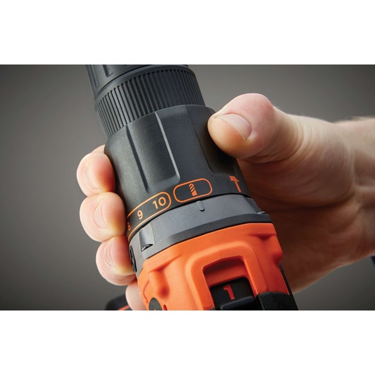 BLACKDECKER BDCHD18KST cordless drill close-up, showing adjustment dial and orange-black body.