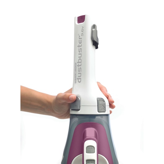 Photo of BLACKDECKER DV9610ECN handheld vacuum cleaner with purple accents, upright angle, hand visible.