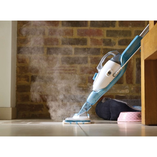 BLACKDECKER FSMH13101SM steam mop cleaning tile floor near pink pet bowl.