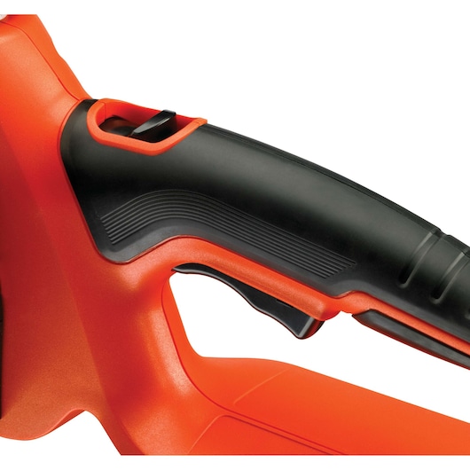 Close-up side view of BLACKDECKER GKC3630L20 chainsaw handle with black textured grip on orange housing.
