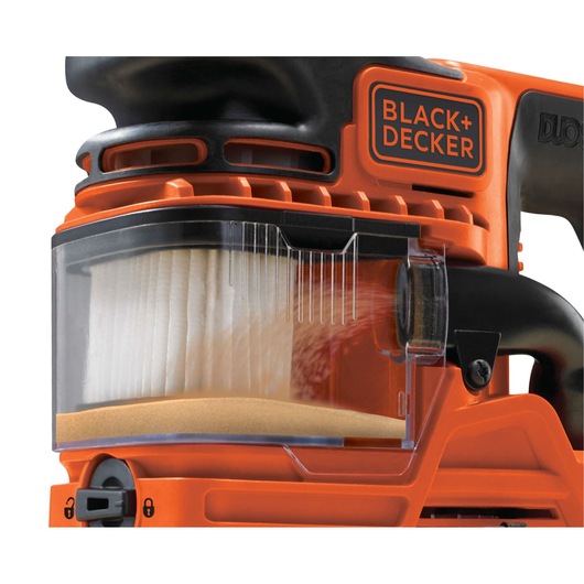 Photo of BLACK+DECKER KA330E sander dust collection box close-up, showing filter and orange body, side angle.