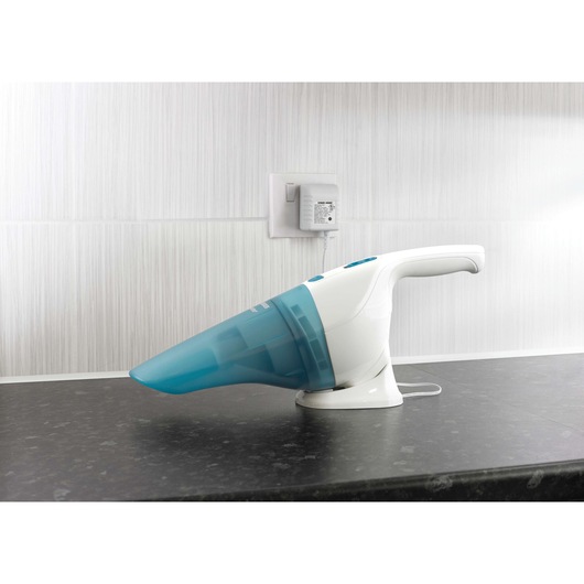BLACKDECKER NW4820N handheld vacuum with white and blue design on countertop side view.