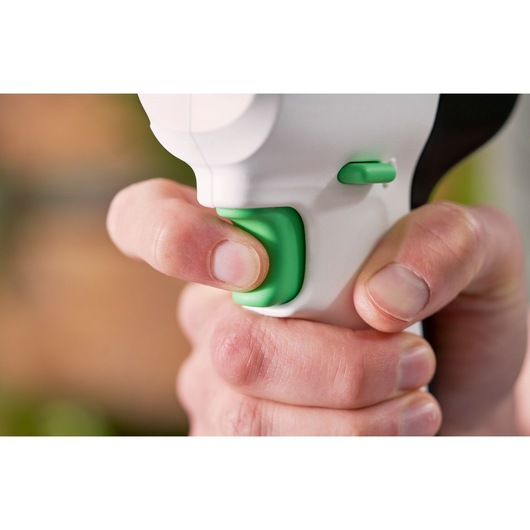 BLACKDECKER REVDD12C drill close-up showing green trigger and button in hand.