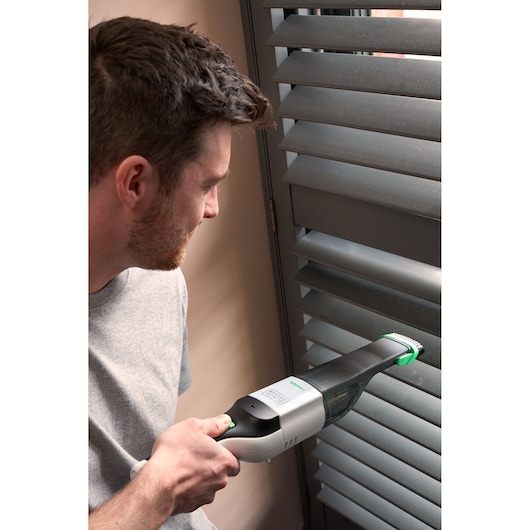 BLACKDECKER REVHV8C handheld vacuum cleaning window blinds indoors