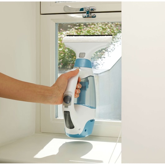 BLACKDECKER WW100K window vacuum cleaner held cleaning glass window, blue and white design.